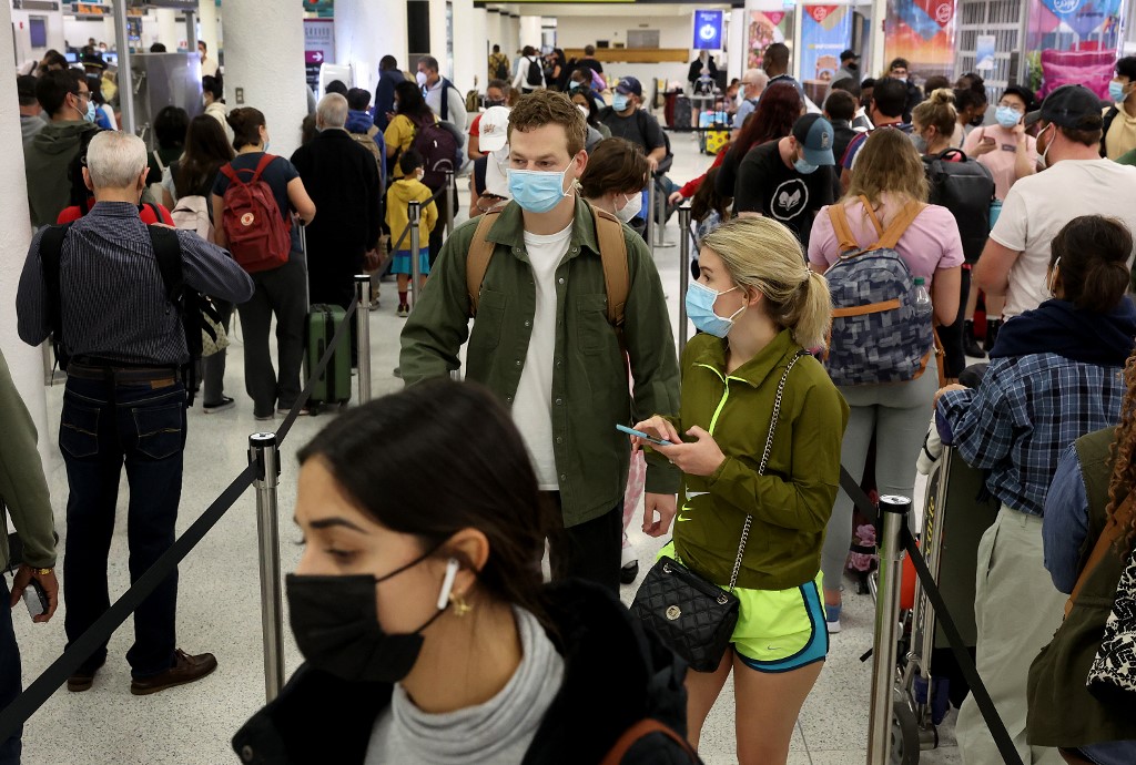 Airlines Cancel Thousands Of Flights As Omicron Cases Surge